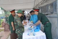 Lấy và bàn giao mẫu hài cốt liệt sĩ tại Nghĩa trang liệt sĩ Thạch Thành